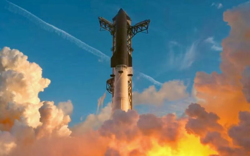 Recently Saved 1 of 1 20 Rocket lifting off through a plume of orange and yellow flames and smoke rising into a blue sky with clouds around it