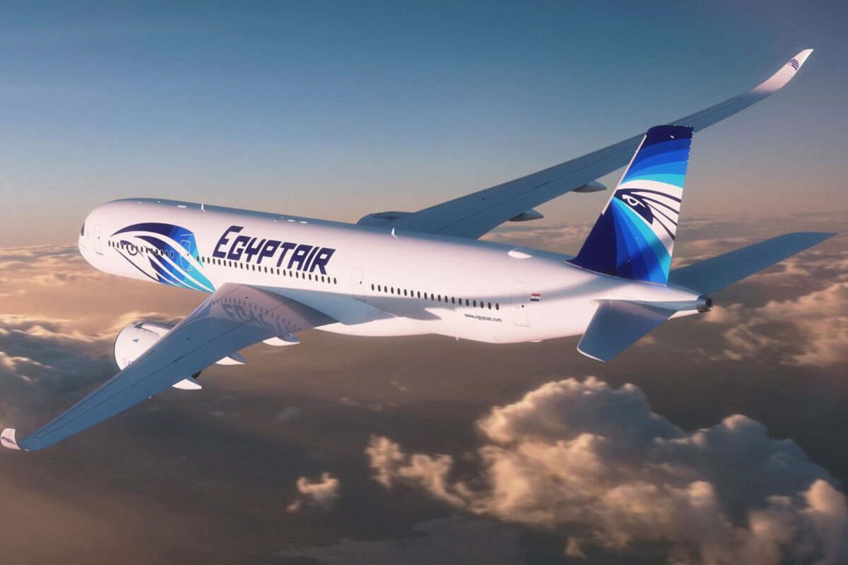 Sydney Airport welcomes EgyptAir as its newest airline EgyptAir passenger jet in flight above the clouds displaying blue tailed livery and logo on the fuselage