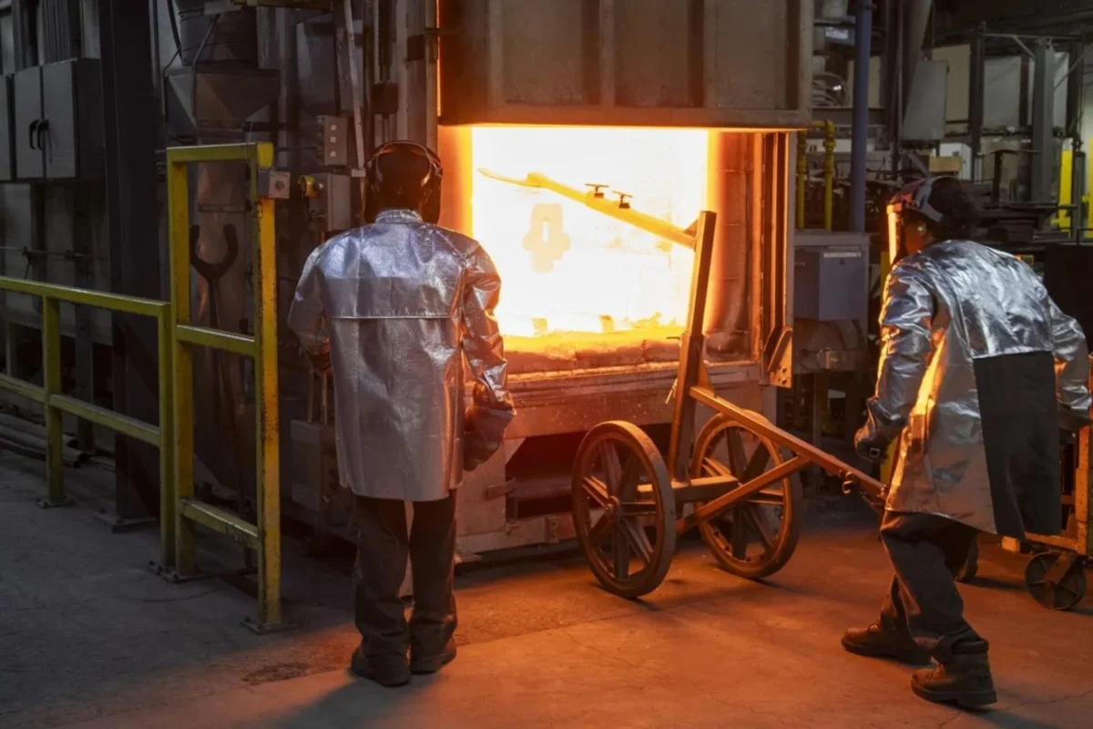 Workers at Consolidated Precision Products Syracuse facility during the investment casting process