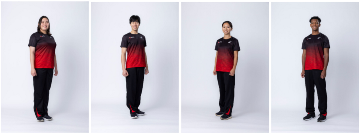 image Four people in black to red gradient uniforms stand in a studio posing for a team photo