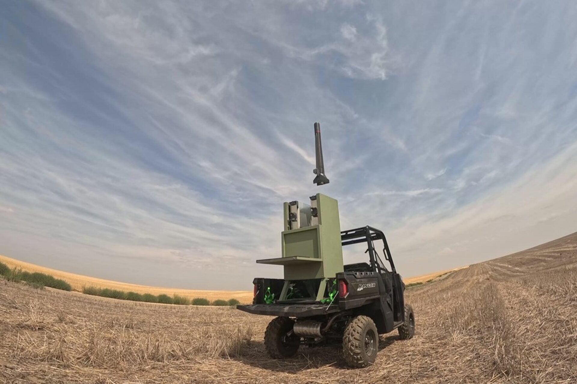 Cummings Aerospace flies two Hellhound S3 drones from a vehicle using one handheld