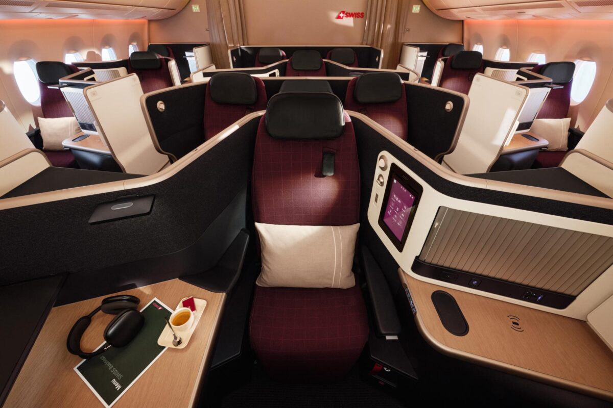 A350 SWISS Business Extra Space 1 Swiss Airlines business class cabin with private lie flat pods burgundy seats beige partitions and personal screens