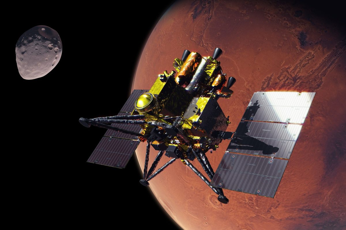 Artists impression of Japans MMX spacecraft near Mars and its moon Phobos where the mission aims to collect samples for return to Earth in 2031