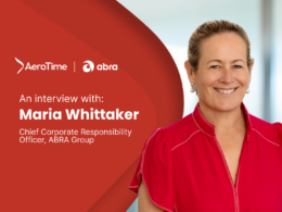 Hero banner announcing an interview with Maria Whittaker Chief Corporate Responsibility Officer ABRA Group with AeroTime and abra logos on a red background
