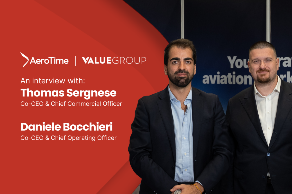 Interview 1620x1080 Thomas Sergnese Daniele Bocchieri Two suited men posing on a split red and dark backdrop with AeroTime and ValueGroup logos interview banner shows names Thomas Sergnese and Daniele Bocchieri