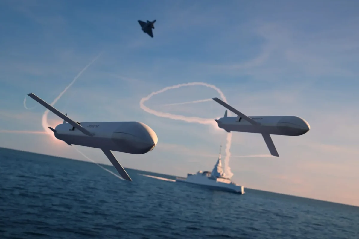 MBDA Remote Carrier Compact drones are depicted operating alongside a frigate and combat aircraft