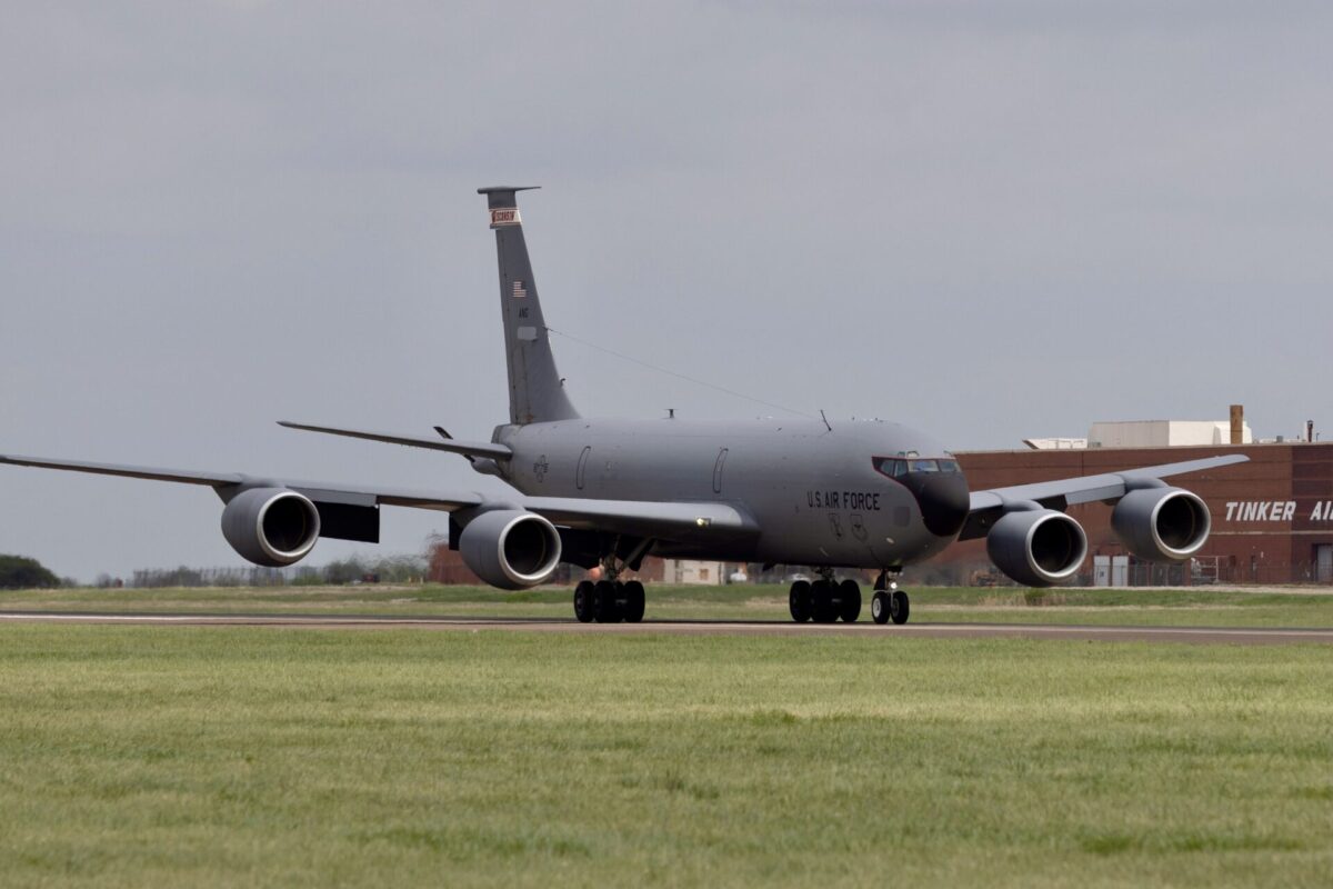 Recently Saved 1 of 1 35 US Air Force C 17 cargo aircraft taxiing on a runway four engines visible gray fuselage hangar backdrop