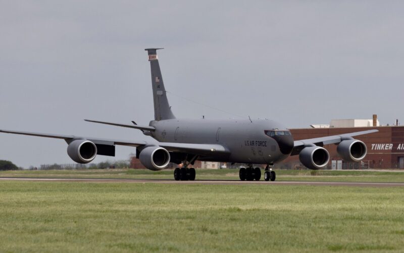 Recently Saved 1 of 1 35 US Air Force C 17 cargo aircraft taxiing on a runway four engines visible gray fuselage hangar backdrop