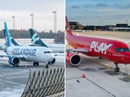 Two commercial aircraft at the gate Icelandair on the left and the red PLAY jet on the right