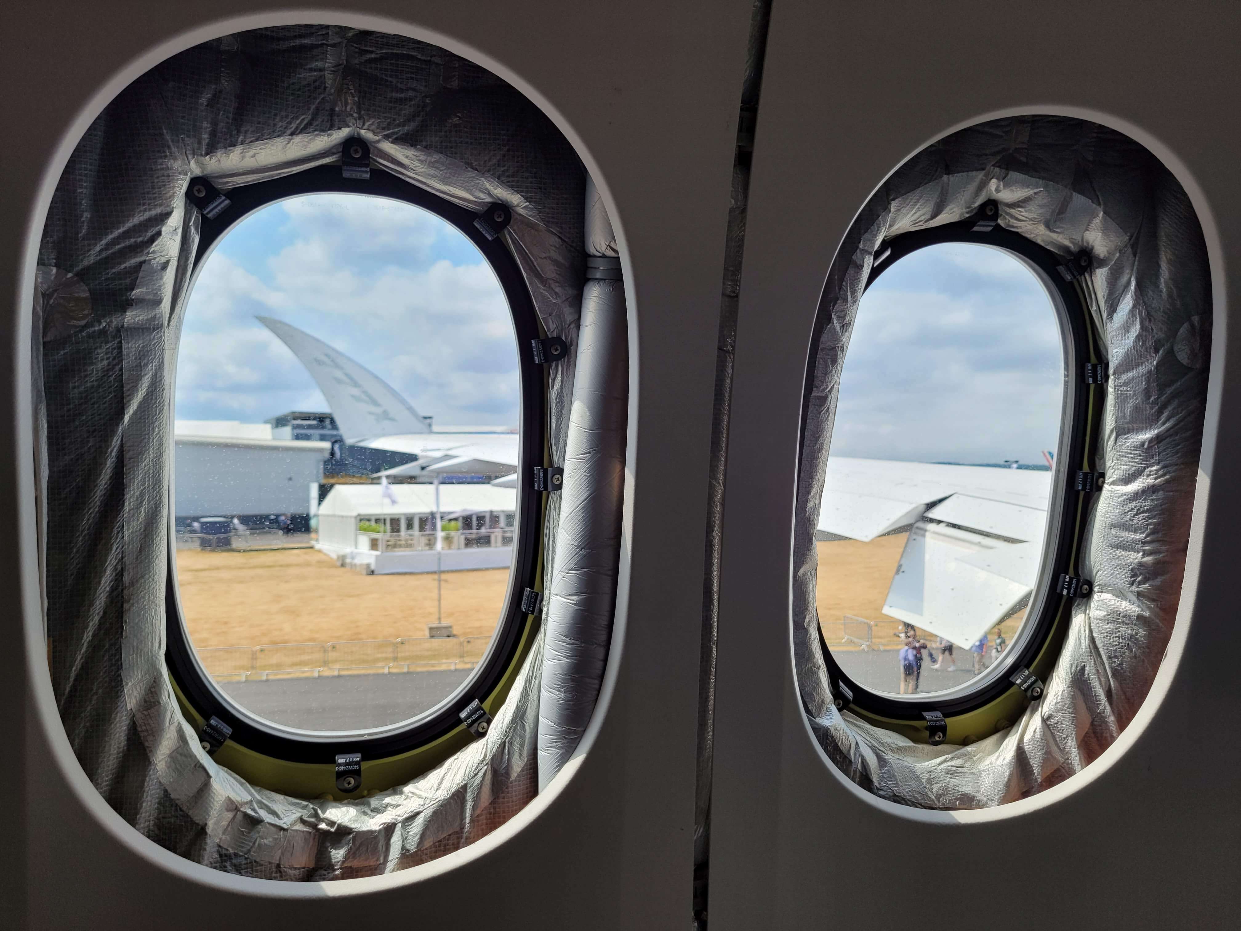 777X wingtip seen from inside the aircraft at farnborough