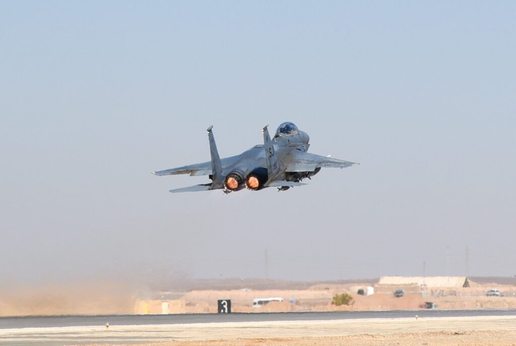 A USAF F-15 Strike Eagle fighter taking off