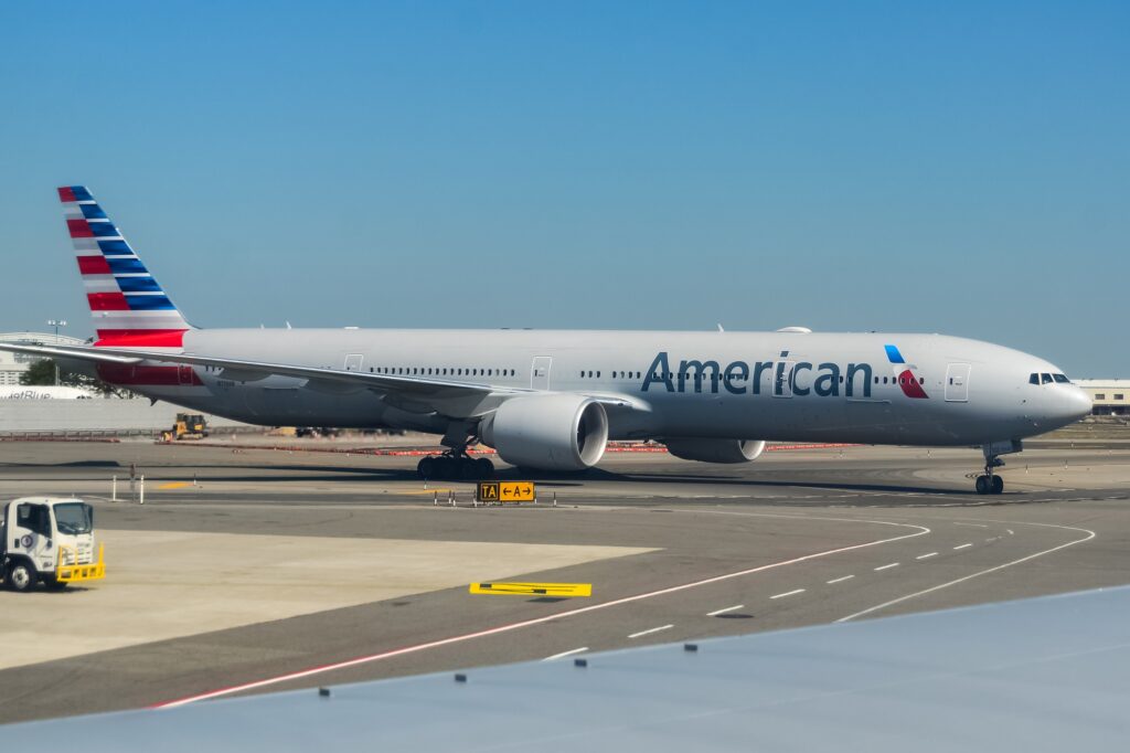 American Airlines Boeing 777 taxiing at John F Kennedy International Airport JFK A Delta Air Lines Boeing 737 and American Airlines Boeing 777 almost collided on the runway at John F Kennedy International Airport JFK