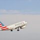 American Airlines Airbus 319-132 commercial jet departs from John Wayne International Airport in Santa Ana, California