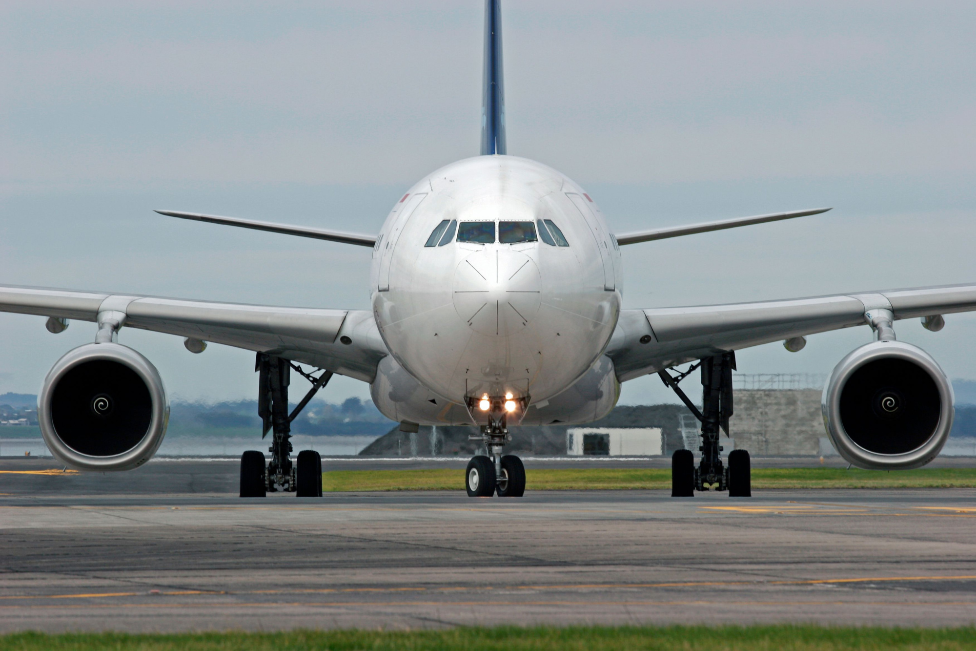 An A330 aircraft taxiing on the apron