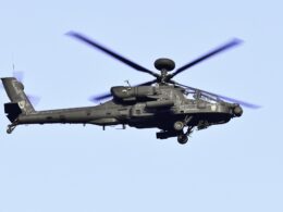 An AH 64E Apache attack helicopter