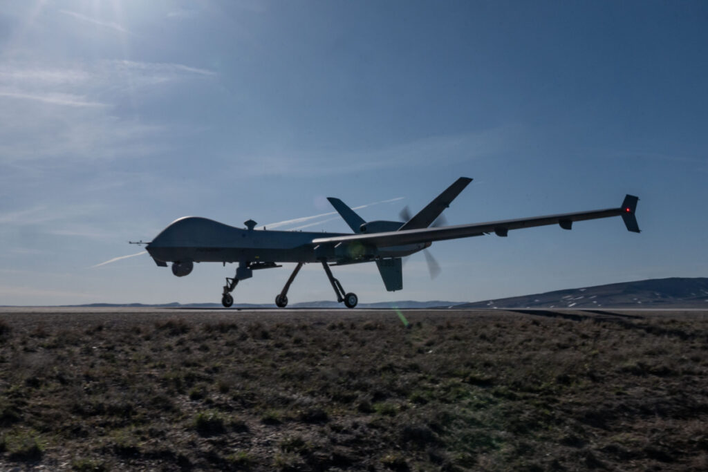 An MQ-9 Reaper drone on a highway in Wyoming