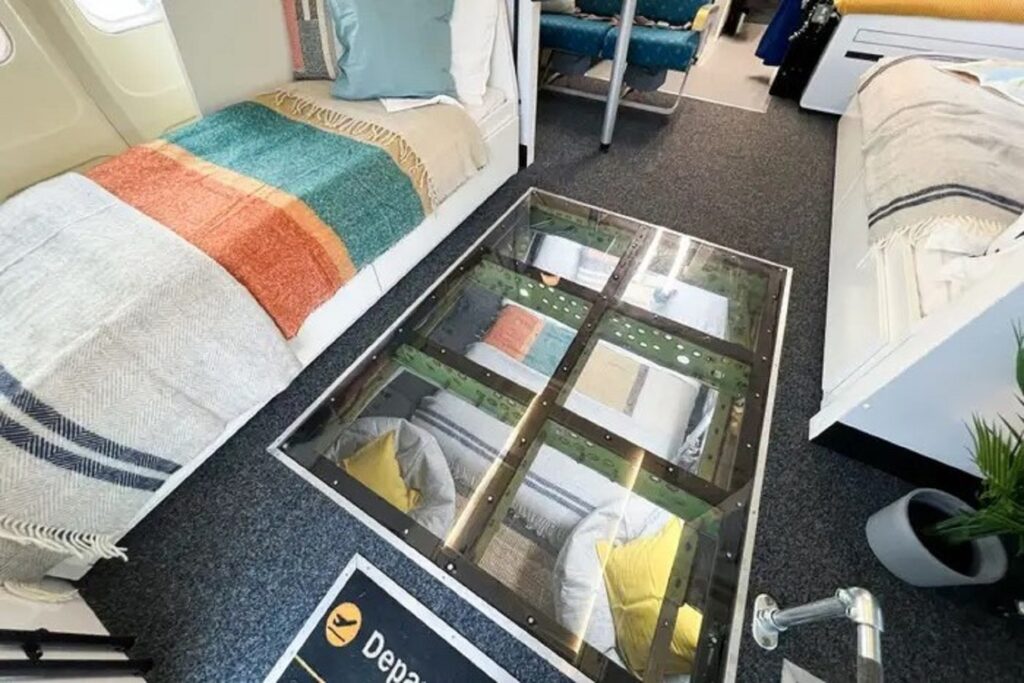 Perspex floor shows lower bedroom on a converted Boeing 737