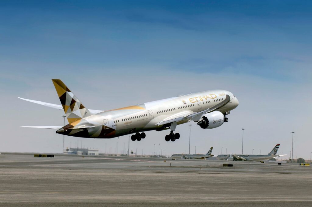 Etihad Airways Boeing Dreamliner B787 aircraft takes off from the runway at airport