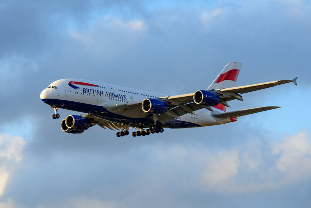British Airways A380 lands at sunset.