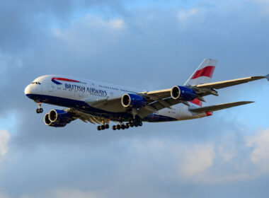 British Airways A380 lands at sunset.