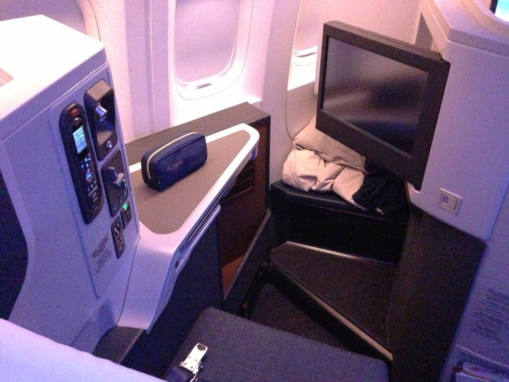 A business class seat onboard a Cathay Pacific B777-300ER