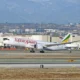 Ethiopian Airlines Boeing 787 8 Dreamliner aircraft is airborne as it departs Los Angeles International Airport Los Angeles California USA