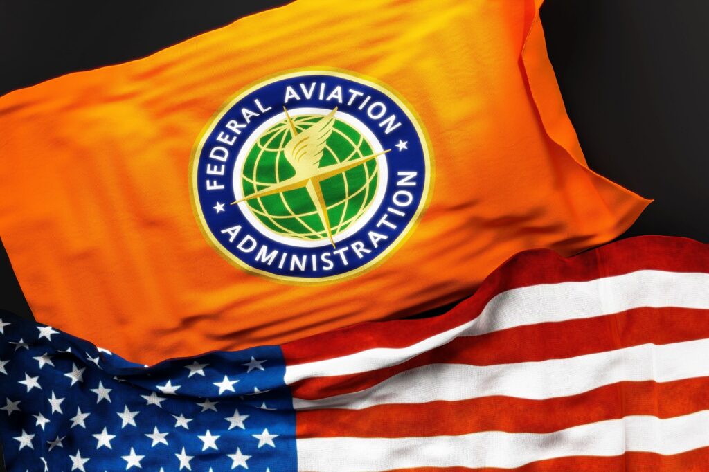 Flag of the FAA along with a flag of the US