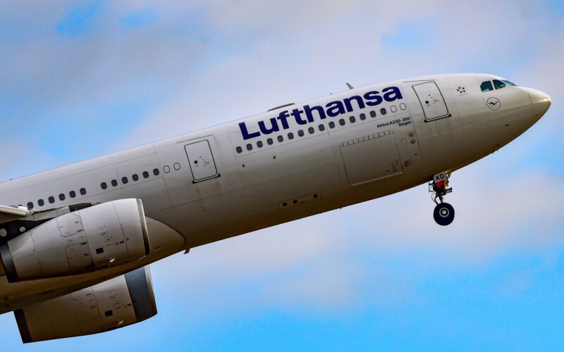 LUFTHANSA AIRLINES Airbus A330-300 over airport.