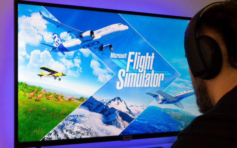 Man playing Microsoft Flight Simulator
