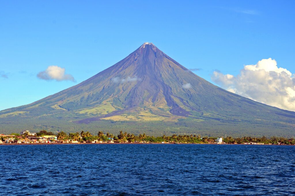 Mount Mayon in Philippines where rescue teams are ascending the volcano to find a plane wreckage