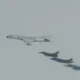 NORAD fighters intercepting a Chinese H-6 strategic bomber