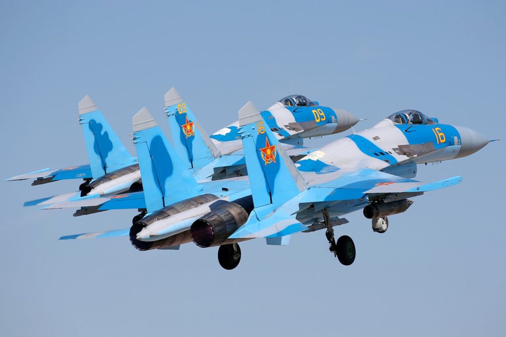 Pair of Kazakh Sukhoi Su 27P fighters flying in formation Pair of Kazakh Sukhoi Su-27P fighters flying in formation