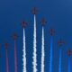 Formation of RAF Red Arrows with coloured trails on blue sky for flypast at Trooping the Colour for Queen Elizabeth's 93rd birthday London, England - June 8, 2019