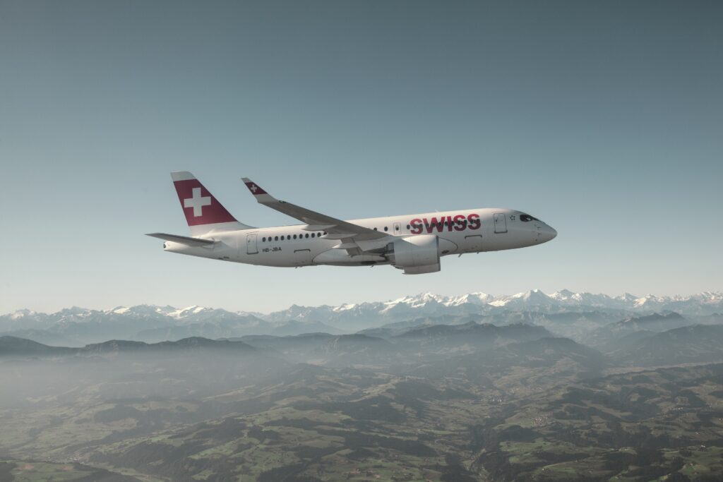 SWISS A220 100 aircraft over the Alps