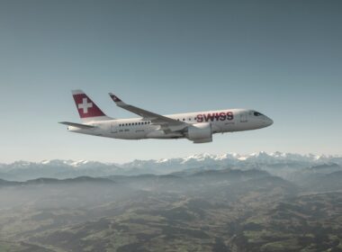 SWISS A220-100 aircraft over the Alps