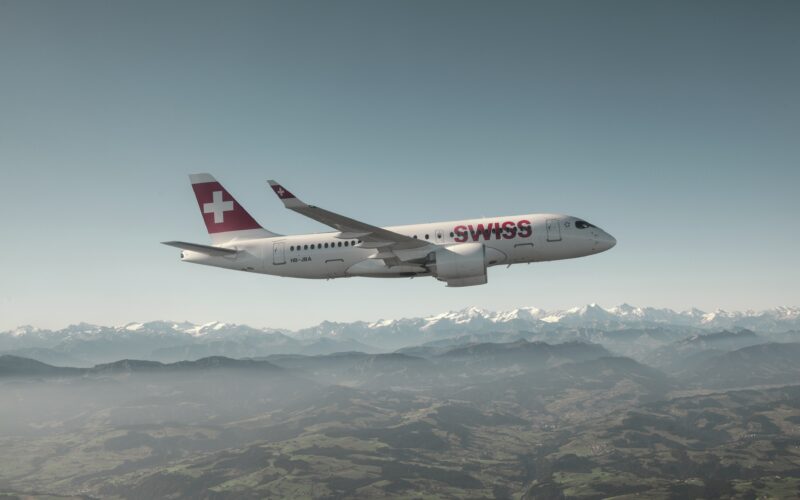 SWISS A220-100 aircraft over the Alps