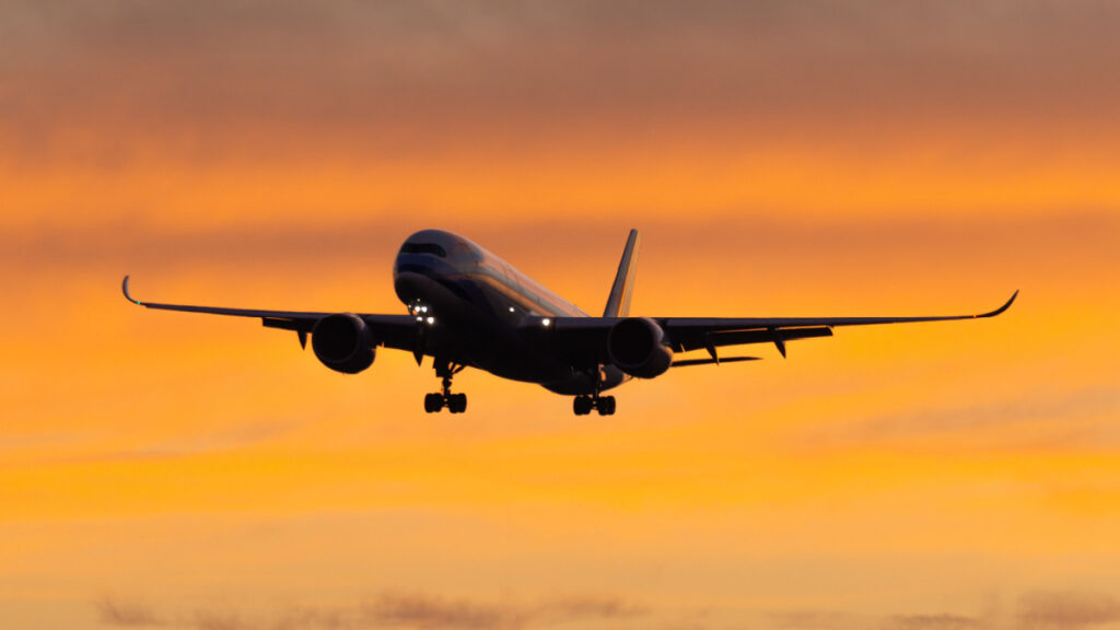 airliner landing in beautiful moring light airliner landing in beautiful moring light