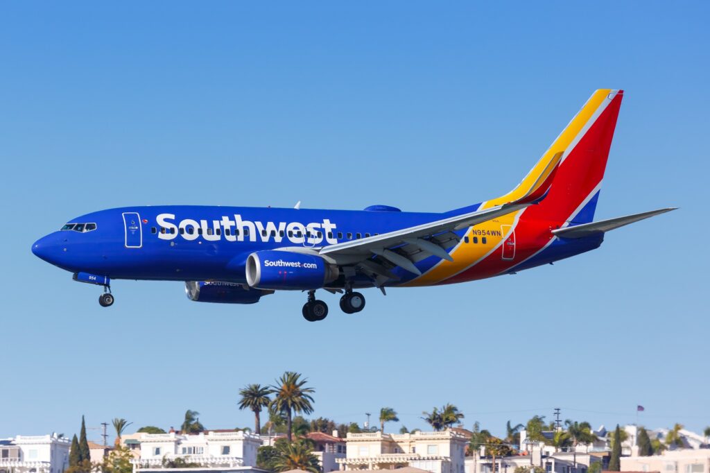 a Southwest Airlines Boeing 737 narrowly avoided a helicopter while landing at Burbank Bob Hope Airport (BUR)