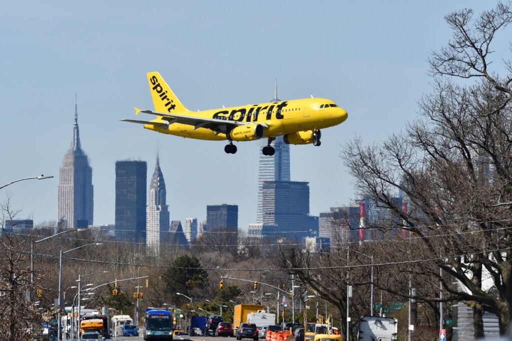 Spirit Airlines Airbus A320ceo landing at New York LaGuardia Airport LGA JetBlue will concede Spirit Airlines assets at LaGuardia Airport LGA to Frontier Airlines