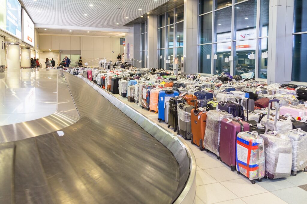 Suitcases piling up in Moscow airport Suitcases piling up in Moscow airport