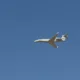 The first EA-37B Compass Call arrives overhead at Davis-Monthan AFB, Arizona