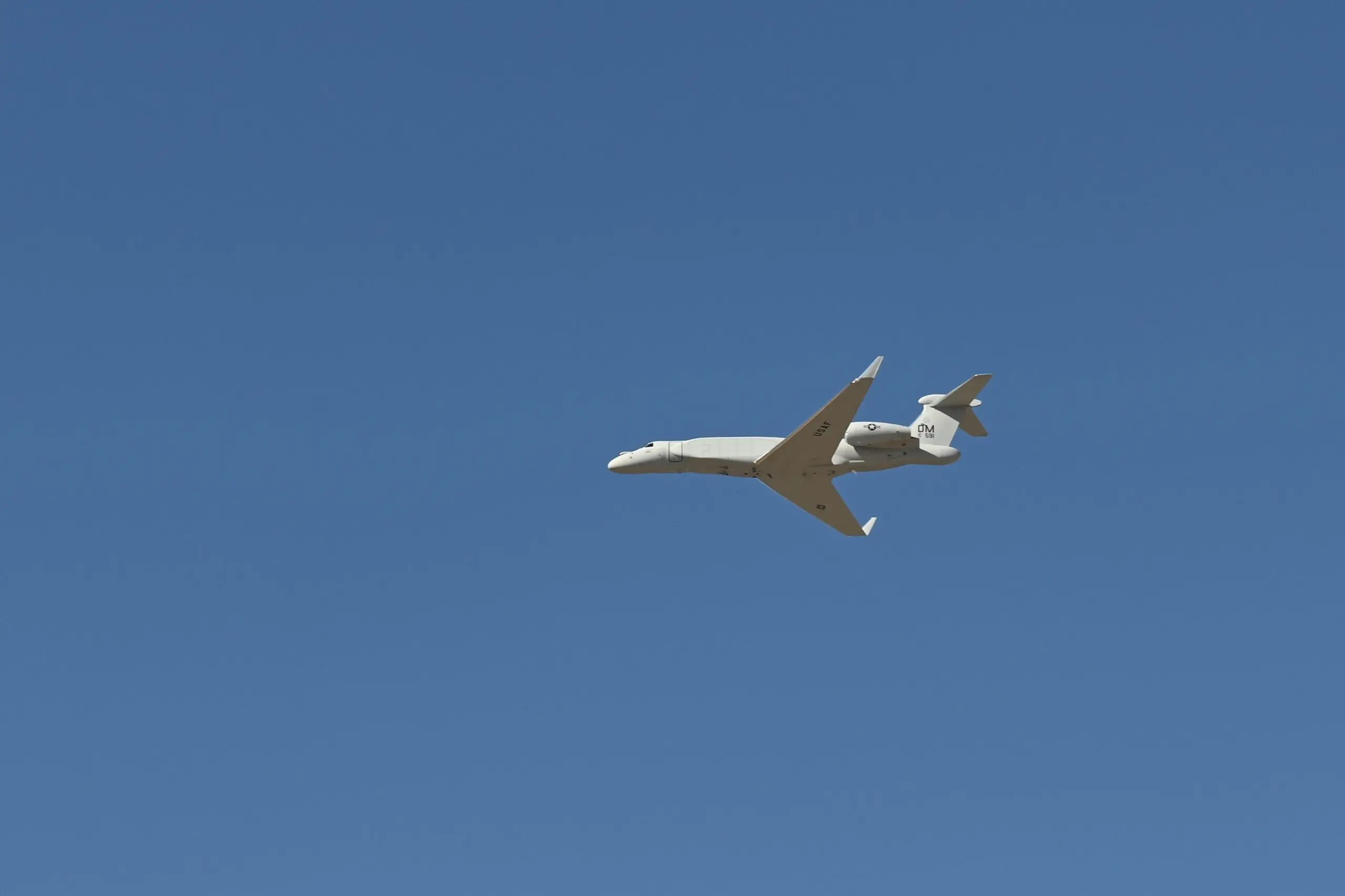 The first EA-37B Compass Call arrives overhead at Davis-Monthan AFB, Arizona