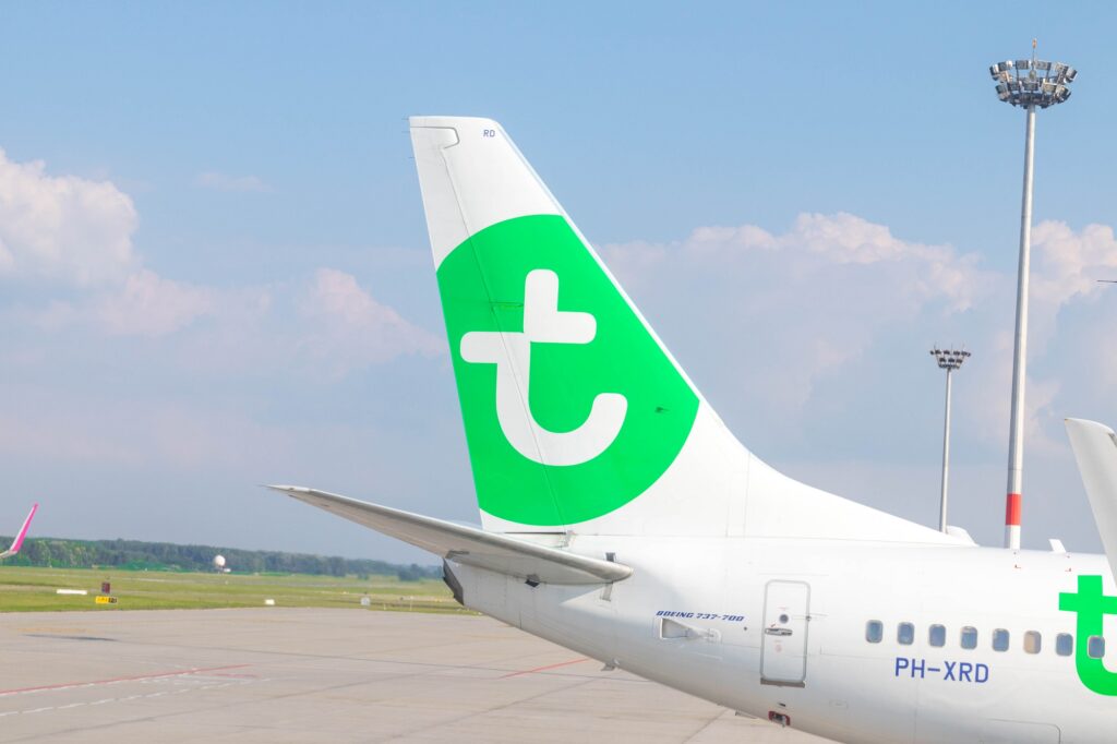 Transavia lowcost flight airplane wings logo