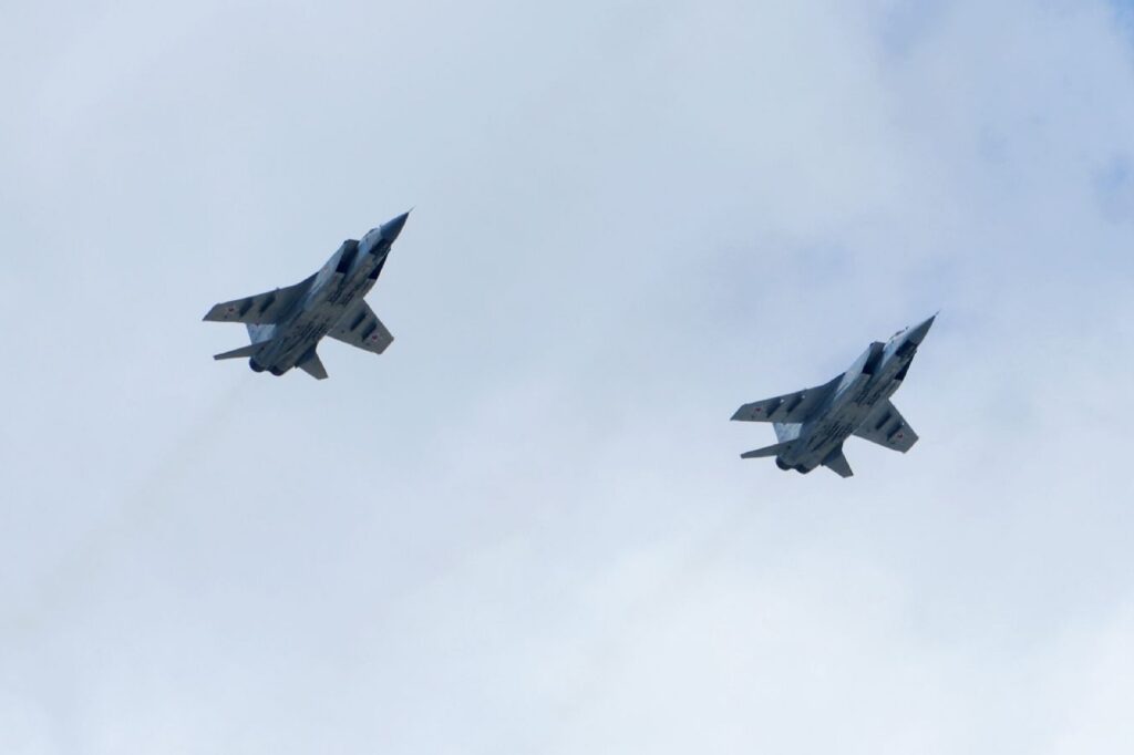 Two MiG 31 fighters flying in formation