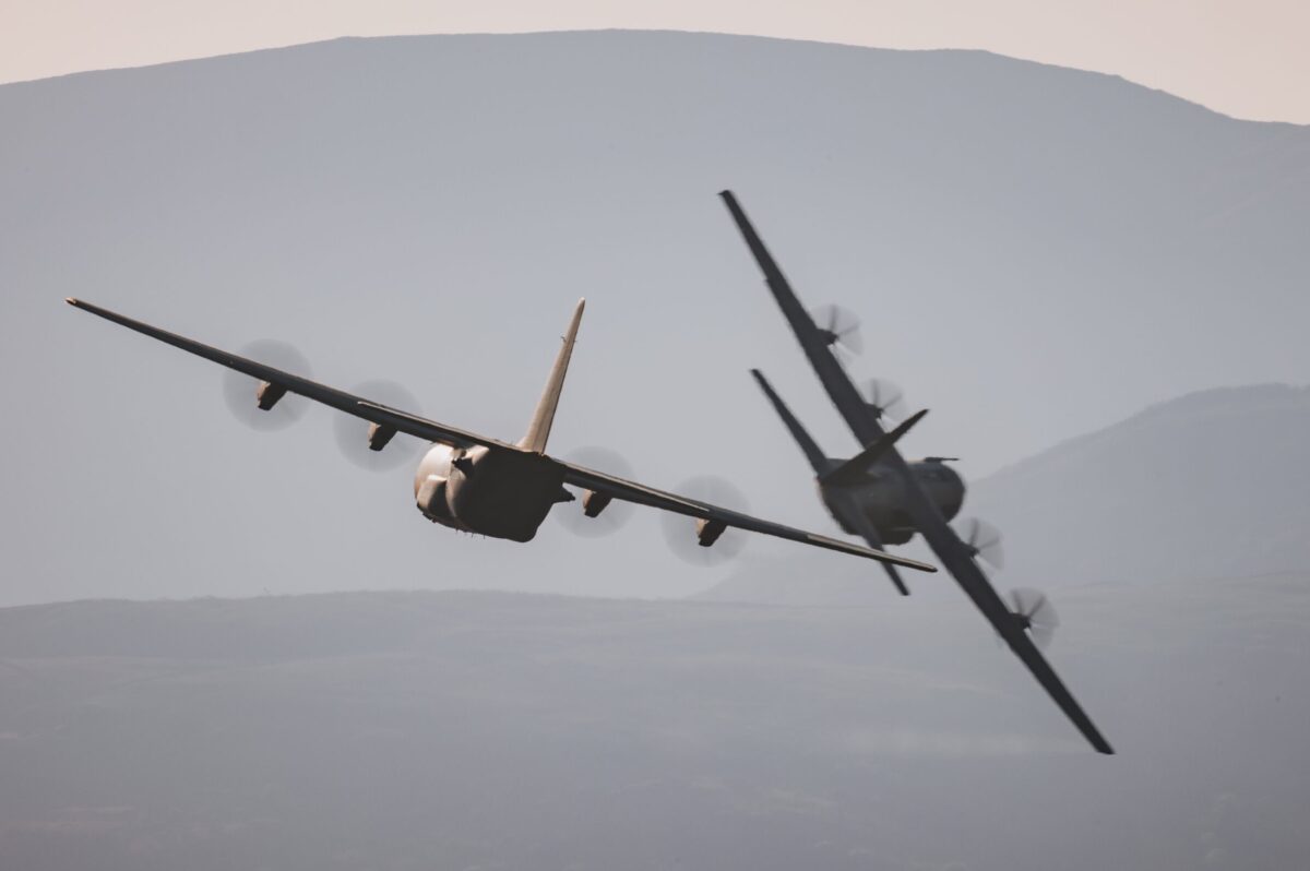 Two RAF C 130 Hercules flying in formation Two RAF C 130 Hercules flying in formation