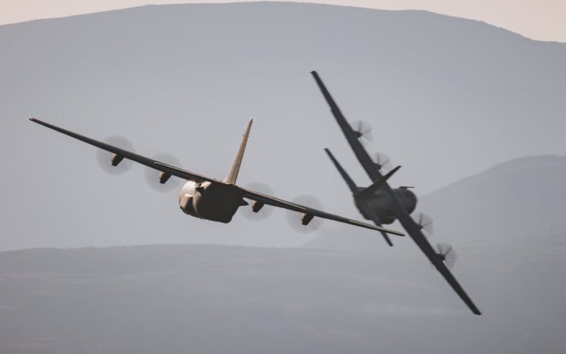 Two RAF C 130 Hercules flying in formation Two RAF C 130 Hercules flying in formation