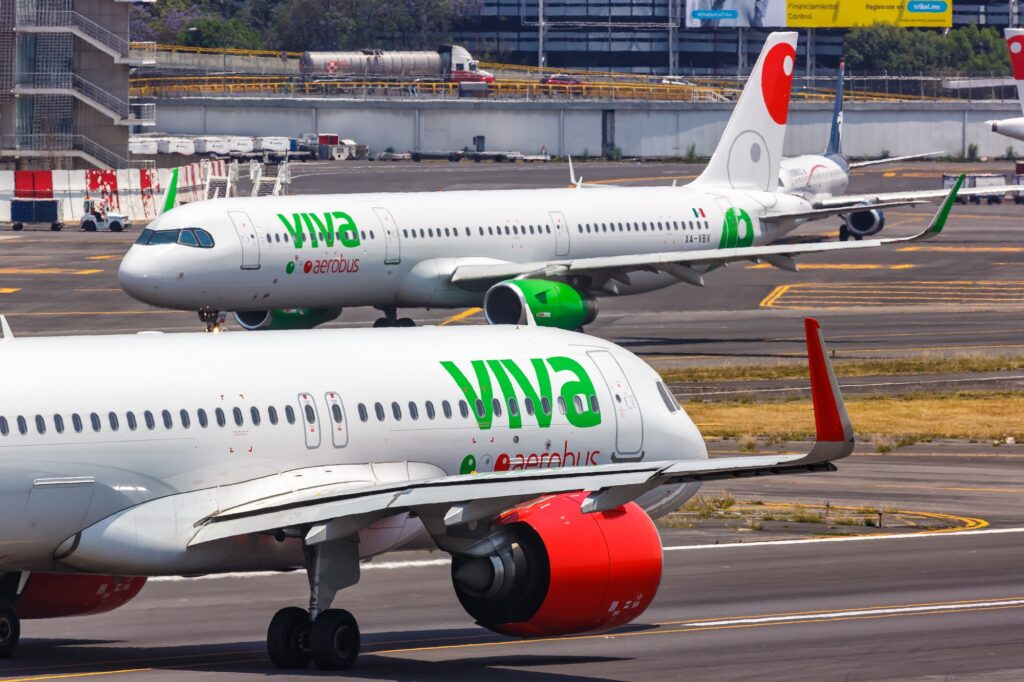 Two Viva Aerobus Airbus A320neo aircraft at Mexico City Benito Juarez International Airport MEX The US DOT blaming the Mexican government suspended the review of the Allegiant Air and Viva Aerobus JV