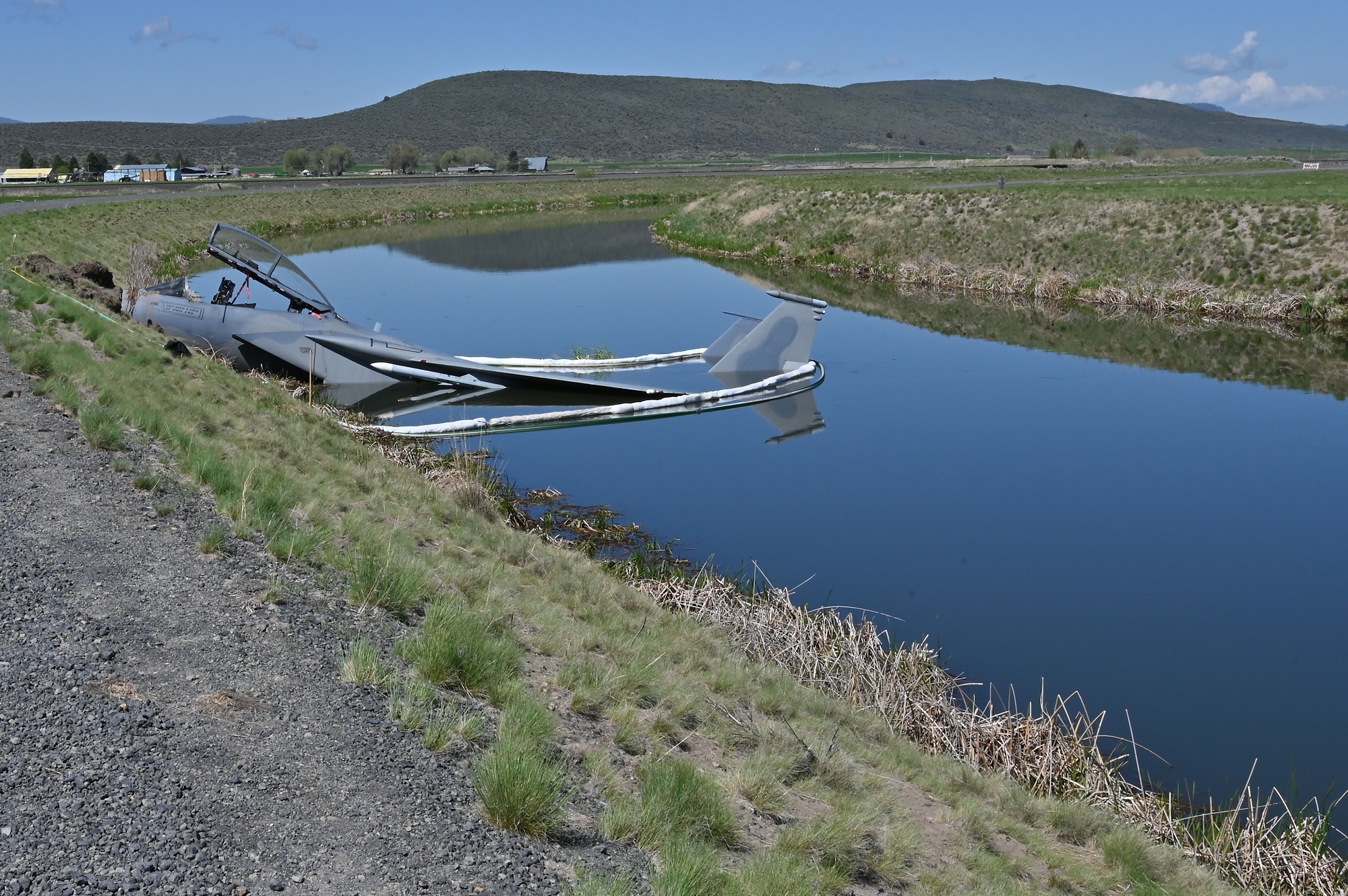 US Air Force F-15 Eagle fighter in a canal
