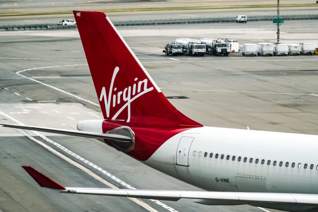 The tail and logo of the Virgin Atlantic Airways Airbus A330-343 Registration G-VINE. at John F. Kennedy Airport