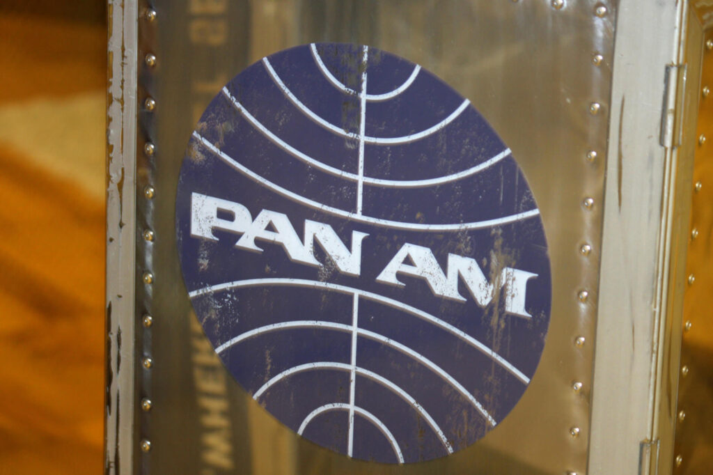 a_faded_pan_american_world_airways_pan_am_logo.jpg